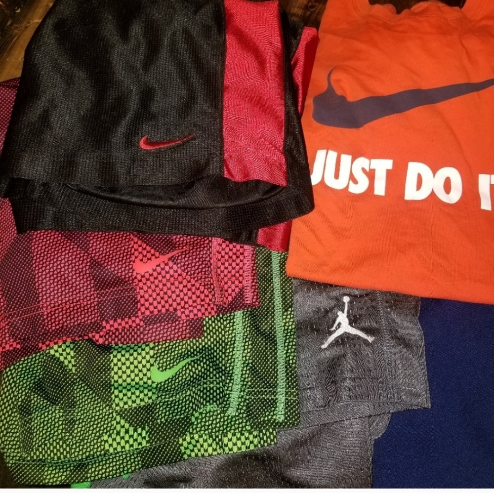 4 pairs Nike shorts. Youth XL size 16/18